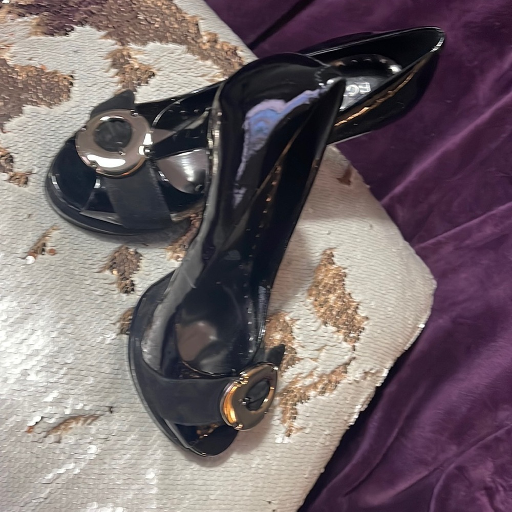 BCBGirls Bobby Black Leather Platform Heels
Gently used.
BCBGirls